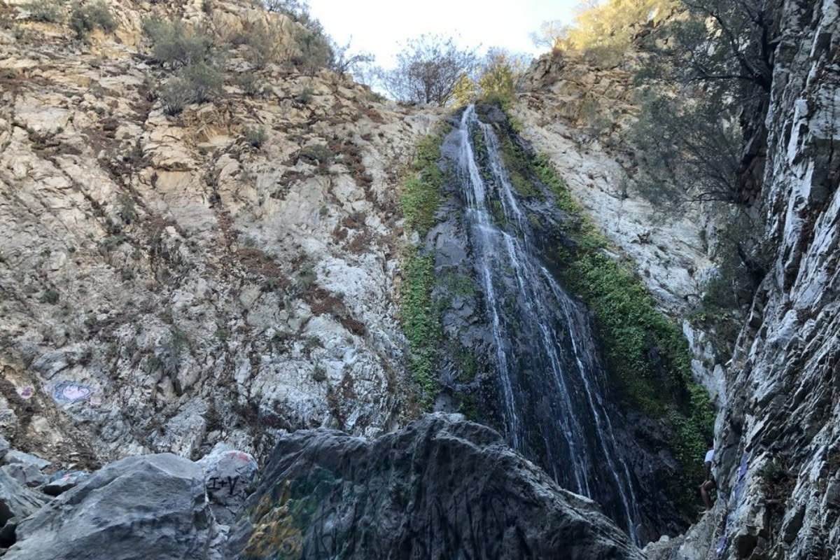 Waterfall spilling down a rocky canyon wall near Lytle Creek
