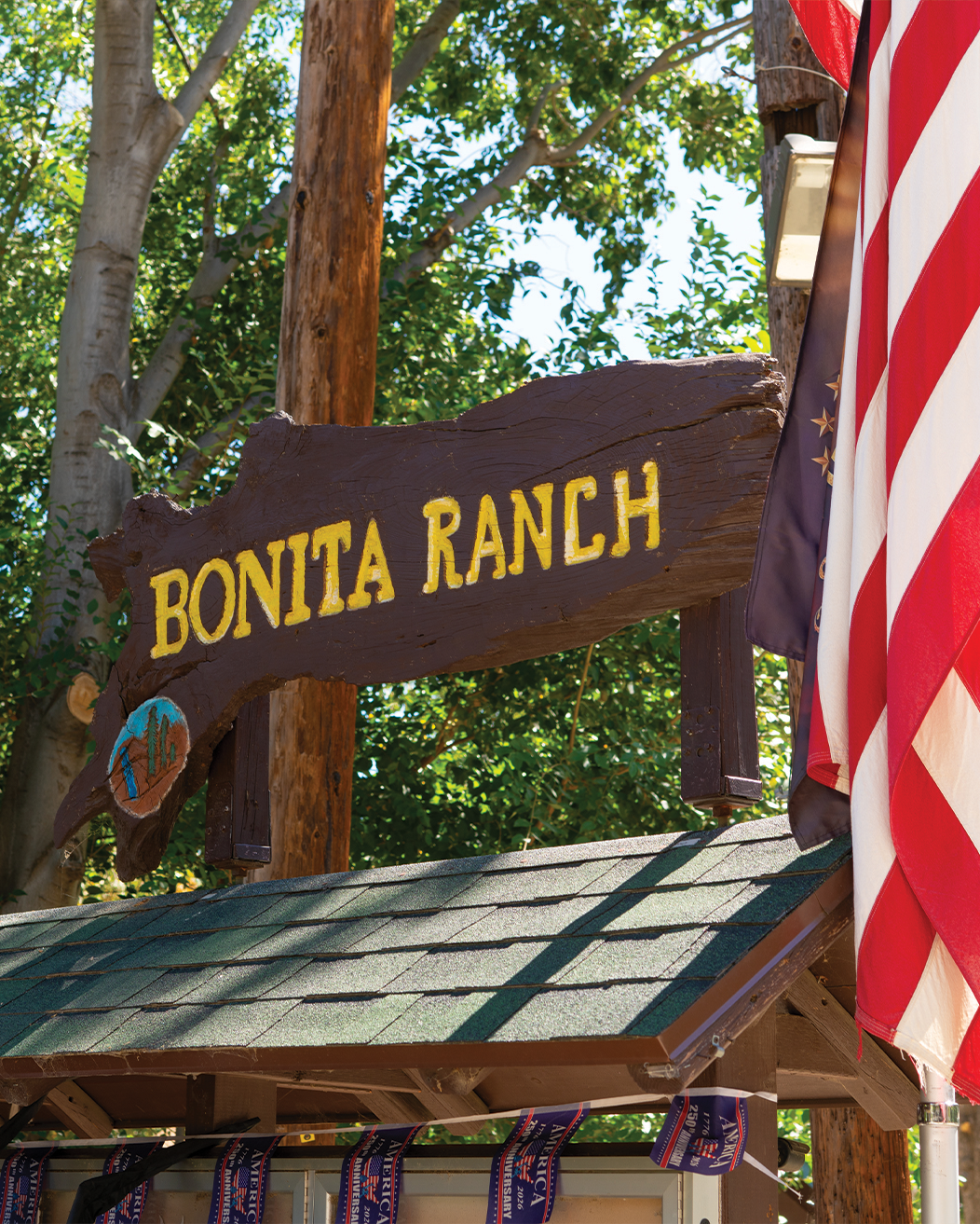 The hand-painted wooden Bonita Ranch sign at the campground entrance